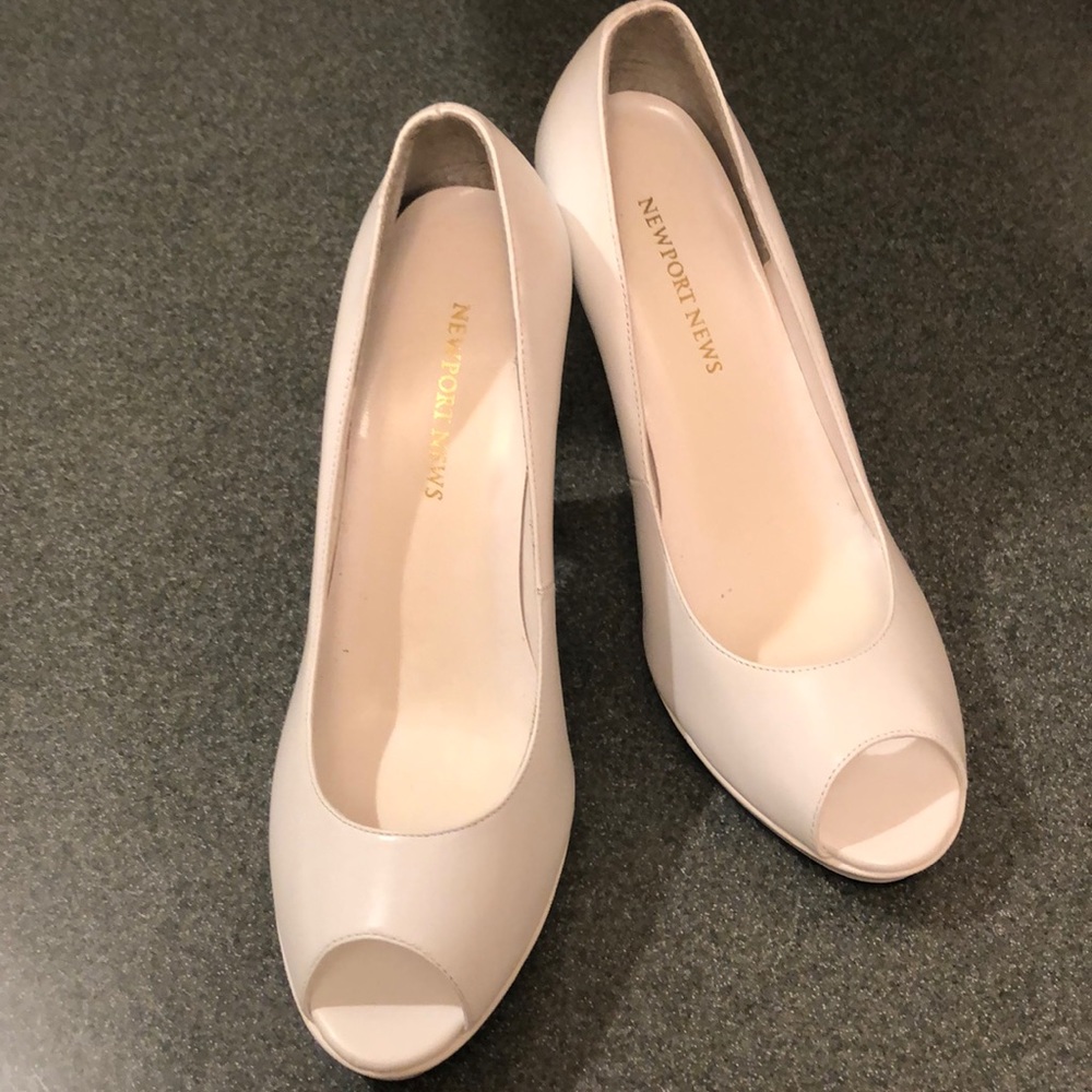 White Leather Pumps. Never been worn.